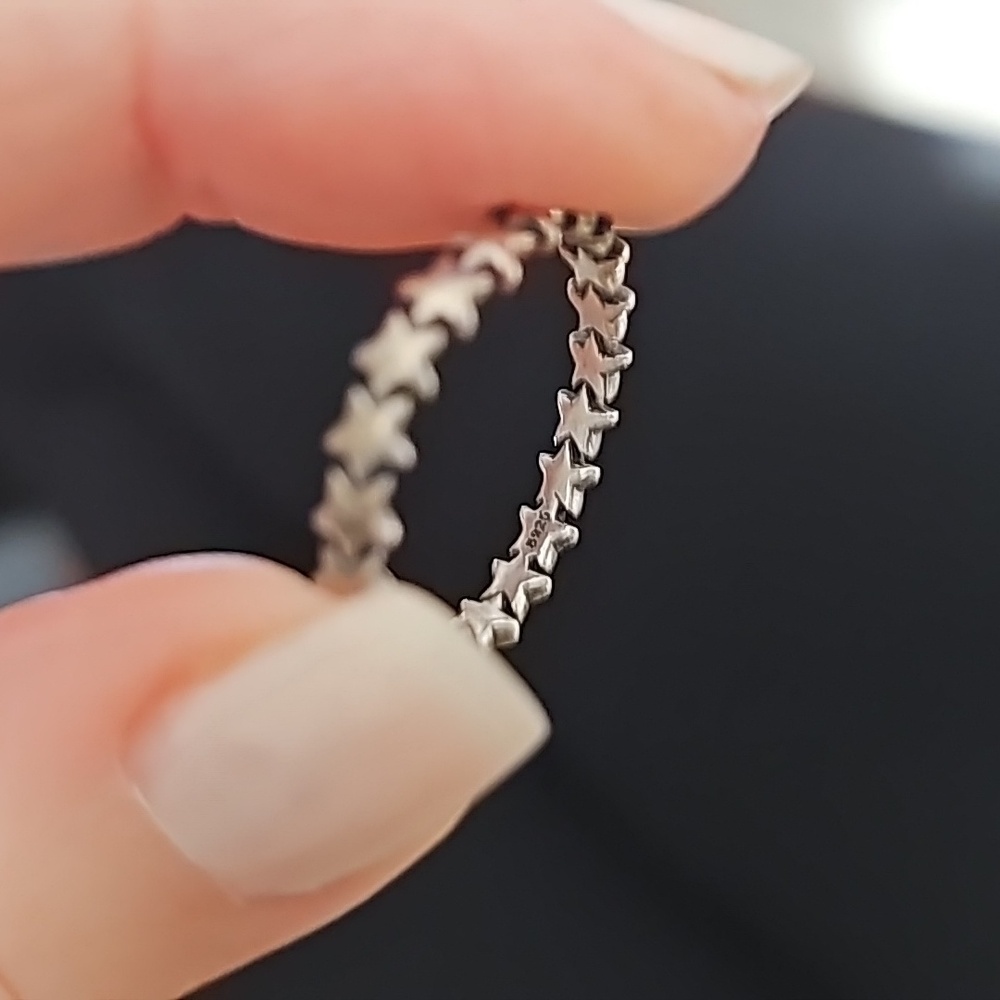 Sterling silver ring with stars all the way around the band. Infinity star band - Picture 4 of 4